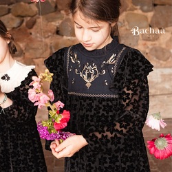 Golden embroidery, ladder lace, and burnout velvet blend in a play of raised and sheer textures. 
Our DEAREST dress is part of our PRESTIGE collection✨

📷 @manuelafranjouphoto 

#kidfashion #prestige #burnoutvelvet #celebration #poeticfashion #bachaa #paris